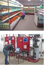 Bild 2: TEKO-Testsupermarkt, bestehend aus 4 NK-Möbeln, 1 Kühlraum, 
Kältebedarf ca. 15 kW. Die Kälteanlage besitzt eine variable Kälteleistung 
zwischen 4 und 40 kW.
